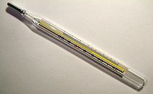 ٿرماميٽر ؛ bukhar2, An analog medical thermometer showing a temperature of 38.7 °C or 101.7 °F wikipedia